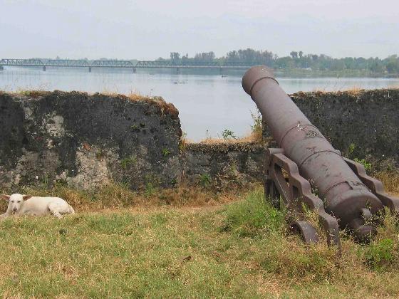 Dutch cannon facing out towards the lagoon bridge Batticaloa Sri Lanka