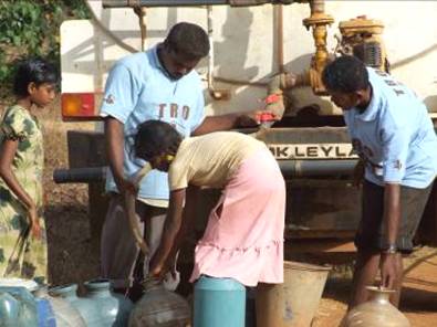 TRO dispensing water to IDPs in Vanni Sri Lanka August 2008