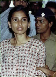 Nalini, one of the 26 accused for the assassination of former Indian prime minister Rajiv Gandhi, is seen in this file picture June 15, 1991 at a special court in a suburb of the southern city of Madras. 