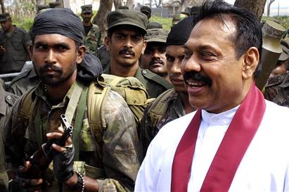 All Smiles: Rajakapse talks to soldiers during his Vakarai visit