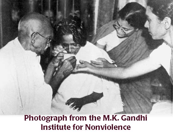 Gandhi helping Salaam