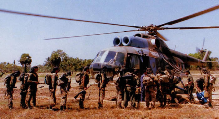 Indian troops embarking onto a Mi-8 Chopper in Sri Lanka. Bharat Rakshak 1987 