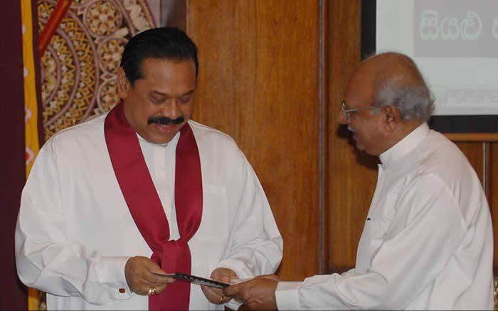 Rajapakse receiving APRC report from Vitharana January 2008