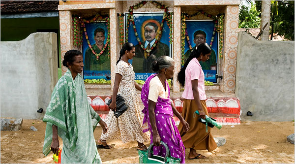 In Batticaloa, Sri Lanka, village women walked past a party office of the Tamil Makkal Viduthalai Pulikal Party last month. Eastern Sri Lanka is holding elections in the hope of achieving some stability after a quarter century of civil war between government forces and the rebel Tamil Tigers. March 10 2008