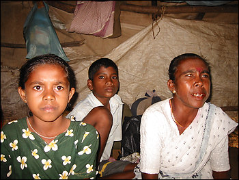 Displaced twice by fighting, Sara Waeathi, 46, her family and her sister's family share a small tent in a barren field outside the Sri Lankan city of Batticaloa.