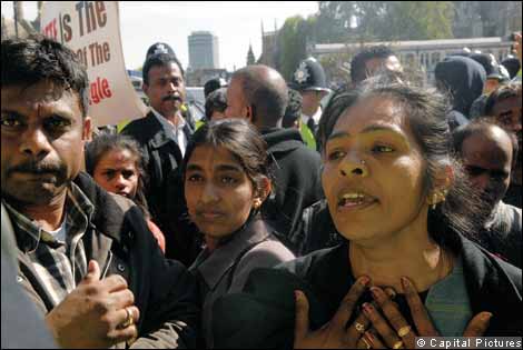 Tamil protesters with placards at Parliament Square