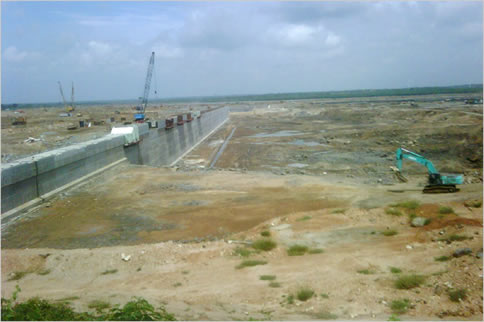 Hambantota Port construction Feb 2010.  Ships will dock along this long wall and other similar structures nearby once the port in Hambantota is complete. 