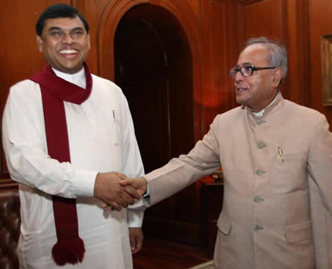 After his 2008 visit to New Delhi, senior Sri Lankan presidential adviser Basil Rajapaksa, seen here with External Affairs Minister Pranab Mukherjee, told the Americans that India had taken up the devolution issue with him, but that the focus was more about resolving fishermen’s problems.