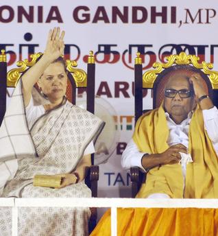 Congress president Sonia Gandhi and Tamil Nadu Chief Minister M. Karunanidhi at an election rally in Chennai on Tuesday. Sharing the dais with the Chief Minister, she said New Delhi would continue to press Colombo for constitutional amendments to ensure equal rights and status to ethnic minorities in the island nation. Photo: S.R. Raghunathan