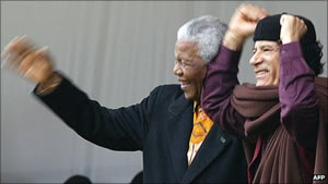 Nelson Mandela and Muammar Gaddafi