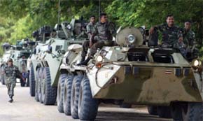 Sri Lankan soldiers at Palali military base in Jaffna in September. The region is considered the cultural heartland of the Tamil minority but is controlled by the military.