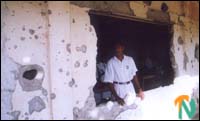 Kilinochchi Central College destroyed by heavy shelling  &  bombing of Sri Lankan forces 2002