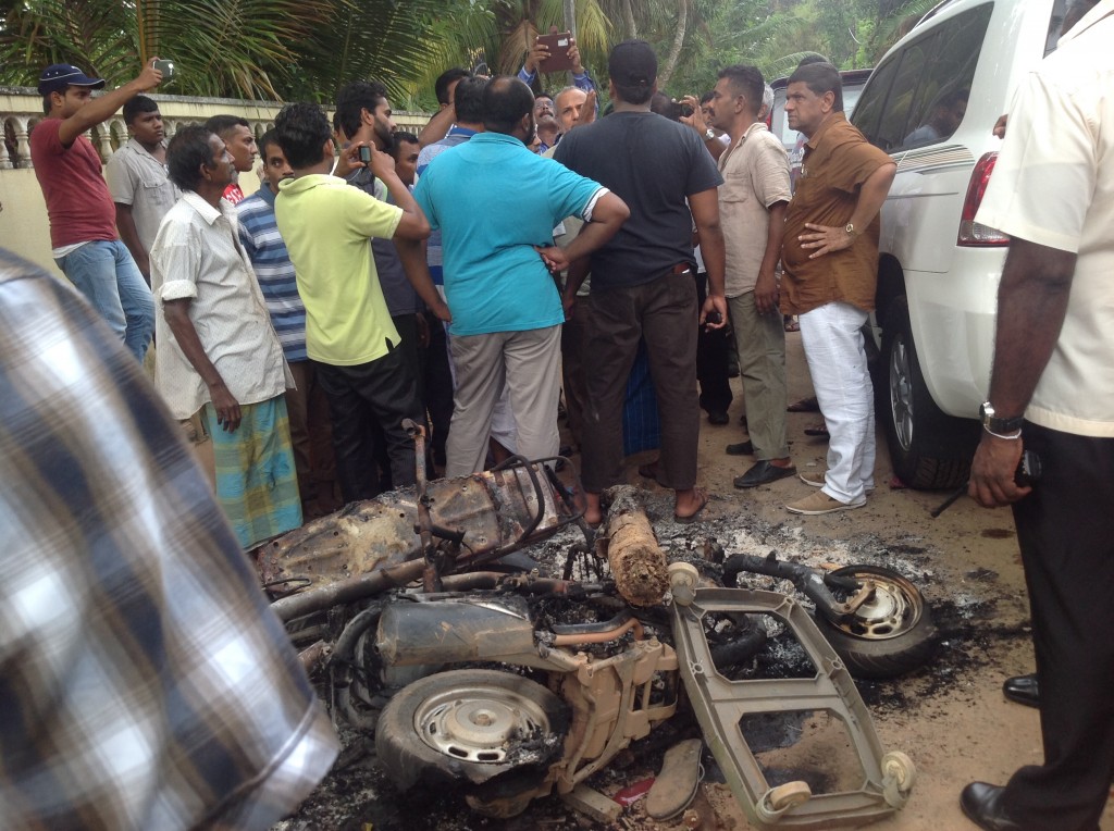 Men in Beruwala come out for the official visit of Rauff Hakeem on Monday, June 16, 2014.