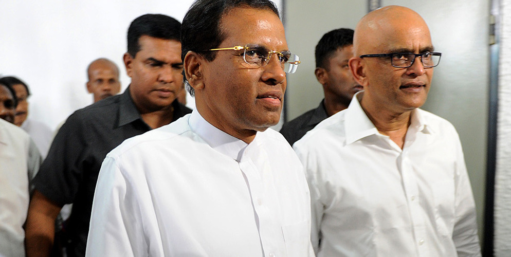Sri Lanka's President Maithripala Sirisena emerges from a meeting naming him leader of the New Democratic Front party. Colombo, Sri Lanka, January 16, 2015. (Ishara S. Kodikara/AFP/Getty Images)