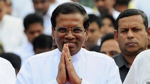 Sri Lankan President Maithripala Sirisena arrives to address the nation from outside the Buddhist Temple of Tooth in the central town of Kandy (11 January 2015)